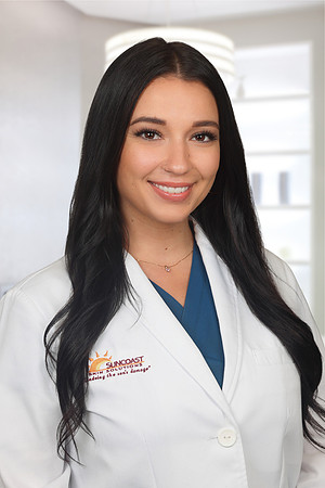 Danie Ely 1 Headshot Office Background