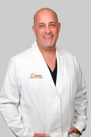 Eric Stakebake Headshot Gray Background 4
