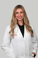 Jenna Caputo Headshot Gray Background 2
