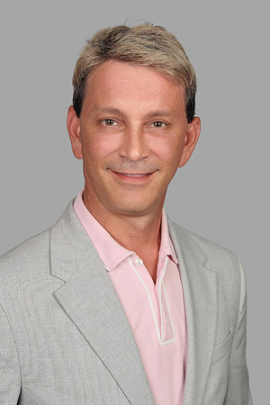 Jon Hilton Headshot Gray