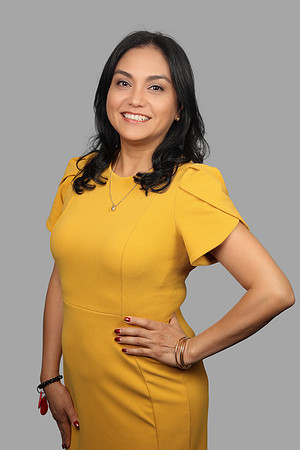 Maribel 2 Hilton Headshot Gray