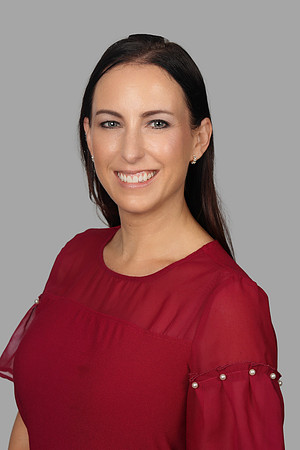 Jenn Smith 2 Hilton Headshot Gray