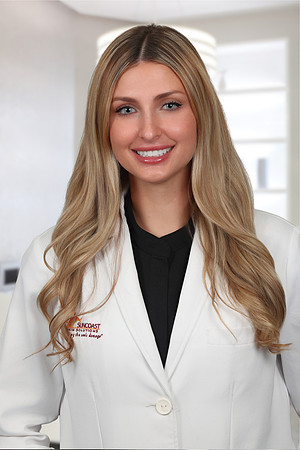 Jenna Caputo Headshot Office Background 1