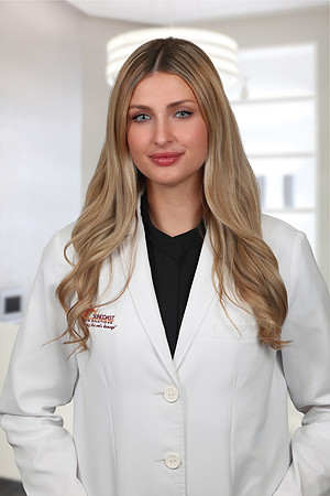 Jenna Caputo Headshot Office Background 4