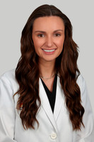 Jade Carbonelli Headshot Gray Background