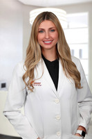 Jenna Caputo Headshot Office Background 2