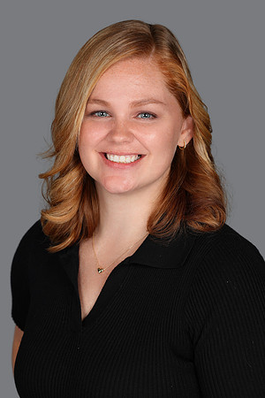Ashley Headshot Gray BG