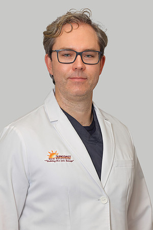 Andrew Styperek Headshot Gray Background