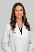 Lindsay Cox Headshot Gray 2