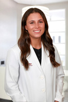 Melanie Stefanchik 2 Headshot Office Background