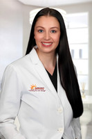 Hannah Henry Headshot Office Background 2