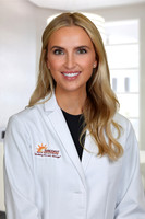 Hanna Stewart 2 Headshot Office Background