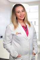Patricia Spitzer Headshot Office Background 3