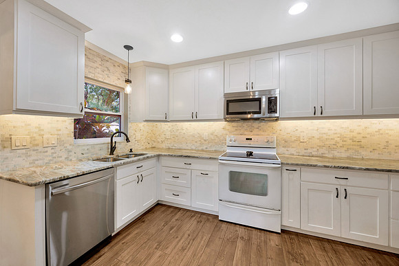 Leeann Sack 15040 Lake Magdalene Blvd.-18